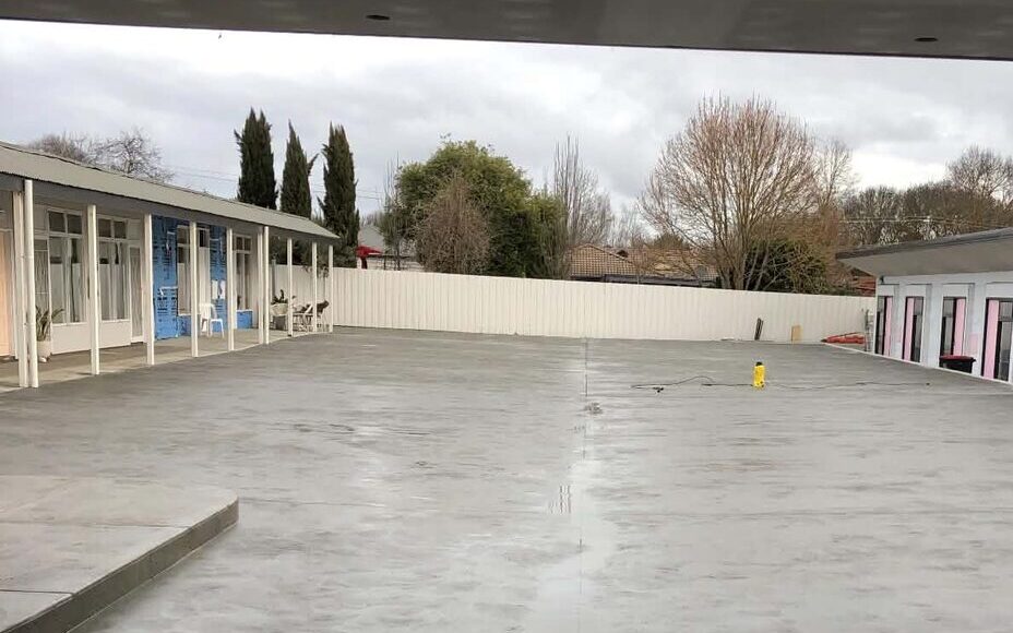 Large burnished concrete slab freshly poured on a Victorian job